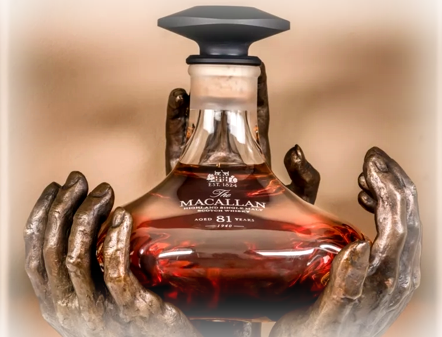 The Macallan The Reach, cradled in bronze hands